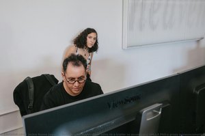 Refik Anadol Makes Final Edits To A Trailer To Accompany The La Phil’s Press Announcement As His Wife, Efsun Erkilic, Looks On. — Jackie Russo Jaquez