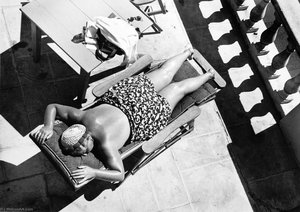 Woman Lying In The Sun, Miami Beach, Florida — Marion Post Wolcott