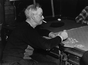 Proprietor Of A Poolhall Playing Cards, Woodstock, Vermont — Marion Post Wolcott