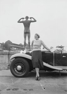 Woman Poses In Front Of A Car — Zoltán Glass