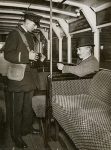 Passenger Buying A Ticket From A Conductor — The Topical Press Agency