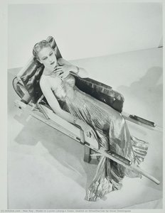 Model In Lucien Lelong’s Gown, Seated On Wheelbarrow By Oscar Domínguez — Man Ray