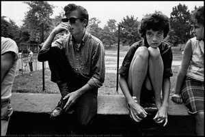 Man In Sunglasses Hanging Out With Friends. — Bruce Davidson