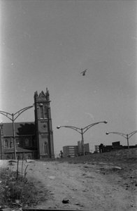 A Helicopter Flies Into Hill District During Pittsburgh Peace March — Charles Martin Hardie