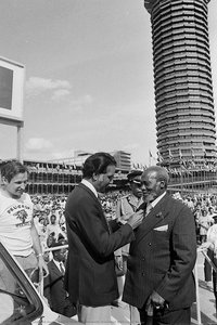 Bharat Bhardwaj Presents President With Lapel Badge — Mohamed Amin