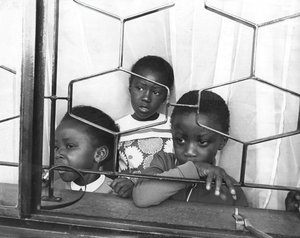 Tom Mboya’s Children, Watched The Funeral Preparations From A Window Of Their Home In Nairobi, Kenya — Mohamed Amin