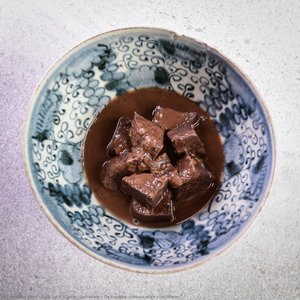 Ox Tongue Cooked With Chocolate — José Luis "chele" Gonzalez