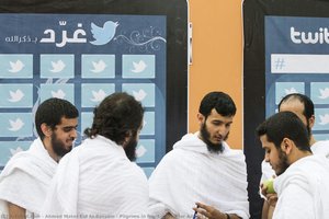 Pilgrims In Front Of Twitter Advert — Ahmed Mater Eid Al-bassam