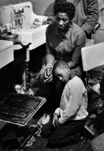 Family Crowds Around Open Oven For Warmth, Harlem, New York — Gordon Parks